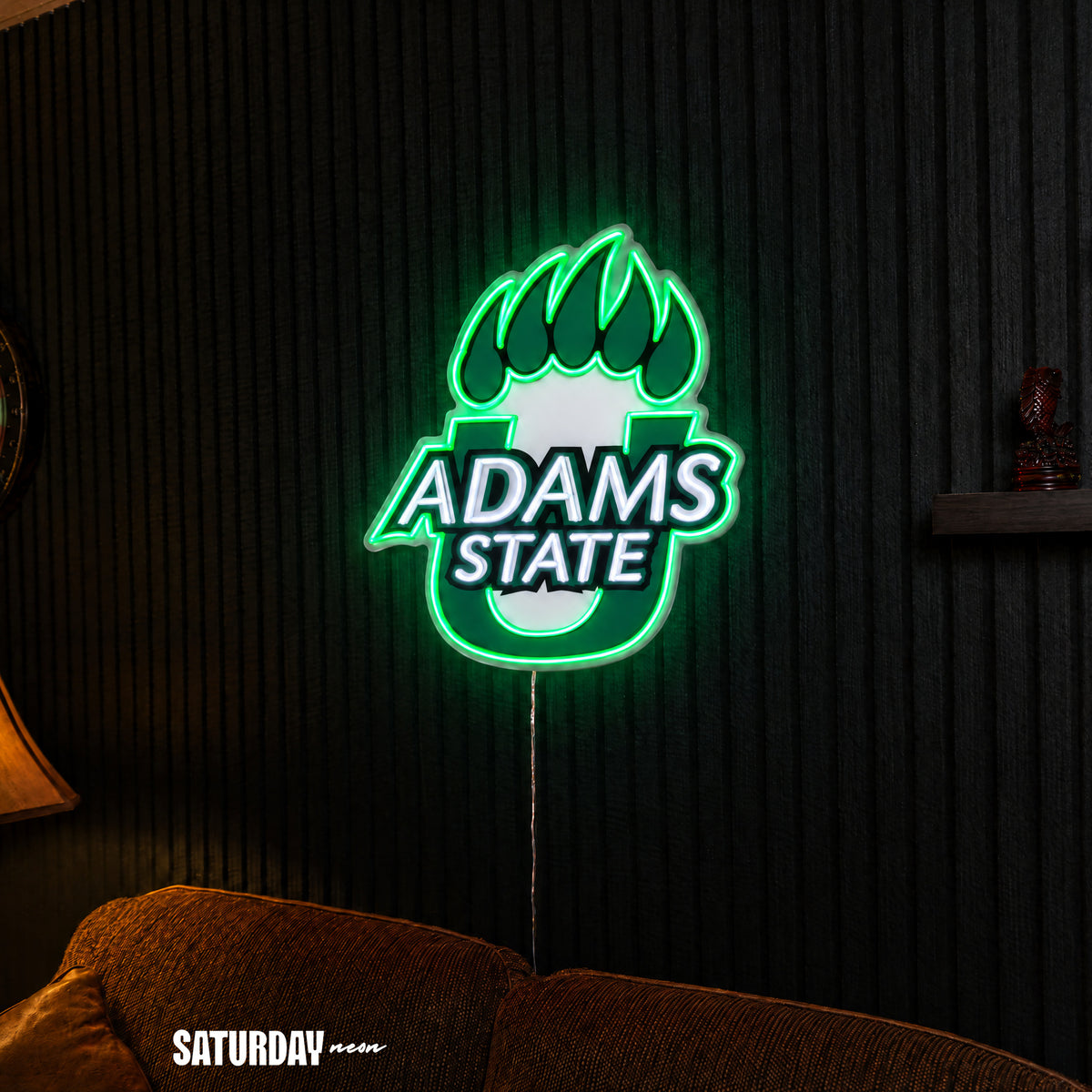 Adams State Grizzlies LED Neon Sign - Max (28.49" x 32") above a couch - Saturday Neon