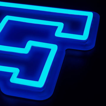Air Force Falcons logo LED neon sign at a side angle, lit