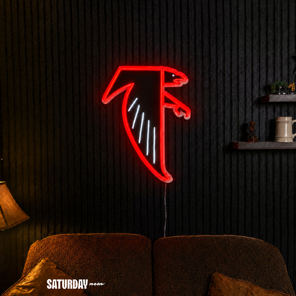 Atlanta Falcons Dirty Bird Vintage LED Neon Sign - 18" x 24" above a couch - Saturday Neon