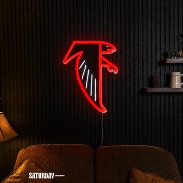 Atlanta Falcons Dirty Bird Vintage LED Neon Sign - 18" x 24" above a couch - Saturday Neon