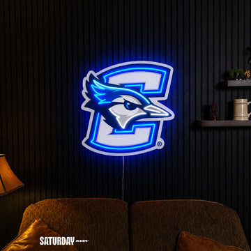 Creighton Bluejays LED Neon Sign - Max (31.86" x 32") in a living room - Saturday Neon