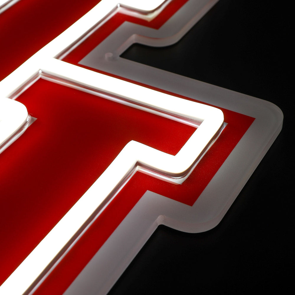 Houston Cougars logo LED neon sign at a side angle, lit