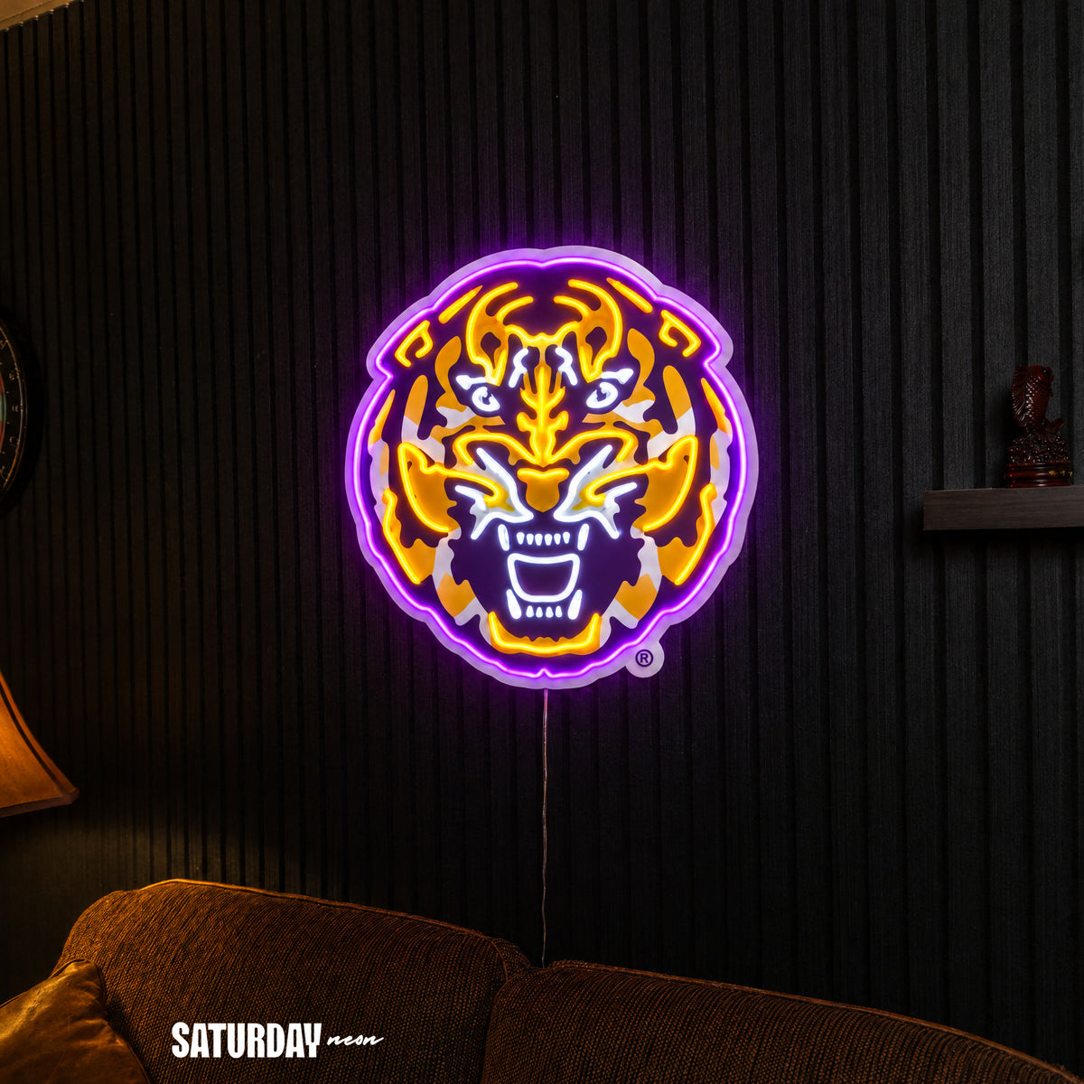 LSU Tigers Tiger Head LED Neon Sign - 24" x 24" above a couch - Saturday Neon