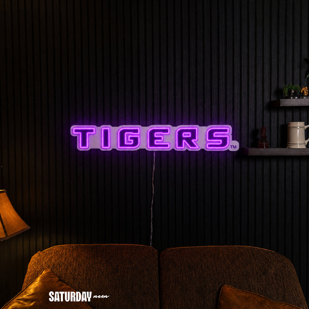LSU Tigers Wordmark LED Neon Sign - 24" x 3.4" in a living room - Saturday Neon