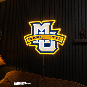 Marquette Golden Eagles MU LED Neon Sign - Max (32" x 24.26") above a couch - Saturday Neon
