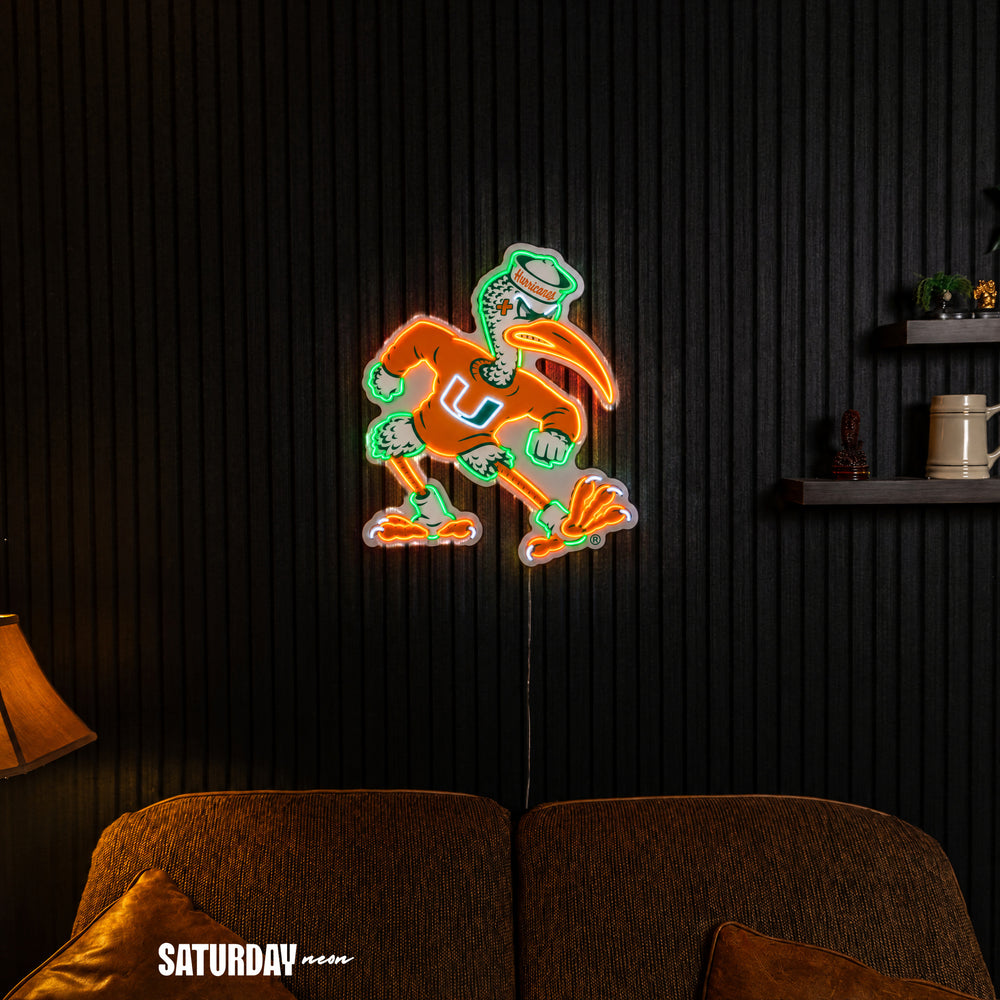 Miami Hurricanes Sebastian the Ibis Mascot LED Neon Sign - 21.49" x 24" in a living room - Saturday Neon