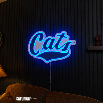 Montana State Cats Script LED Neon Sign - 24" x 16.33" above a couch - Saturday Neon