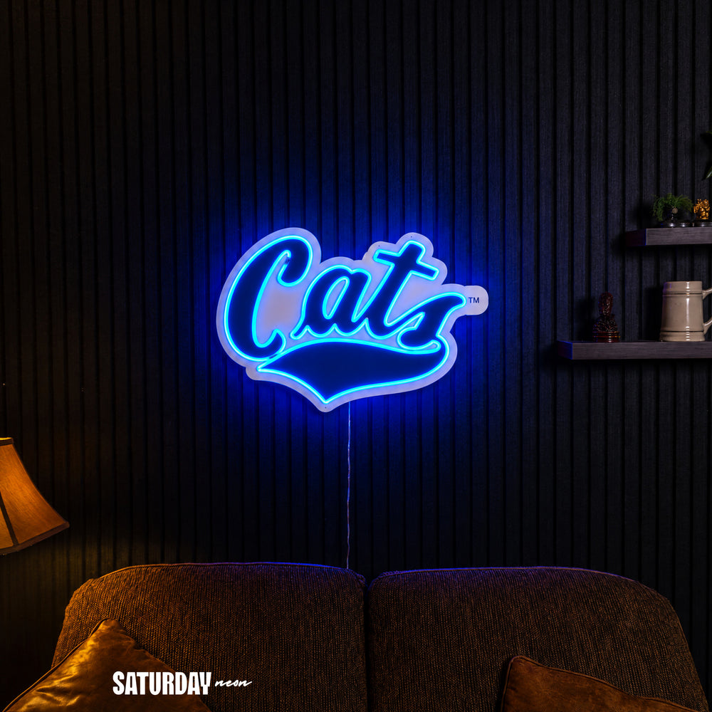 Montana State Cats Script LED Neon Sign - 24" x 16.33" in a living room - Saturday Neon