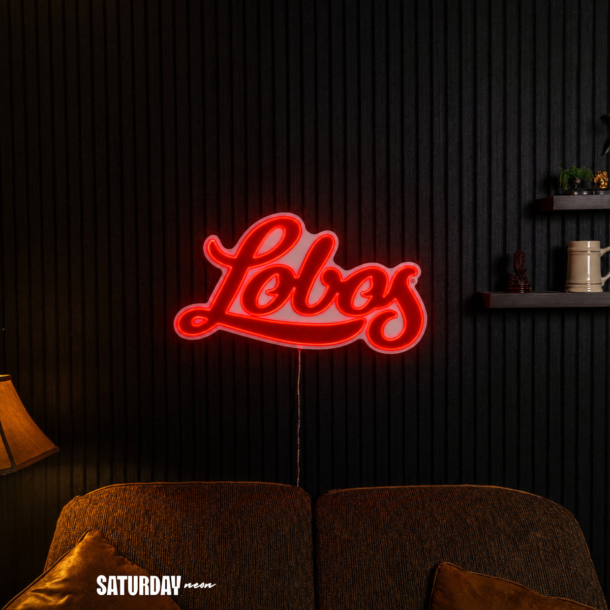 New Mexico Lobos Script LED Neon Sign - Plus (24" x 14.27") in a living room - Saturday Neon