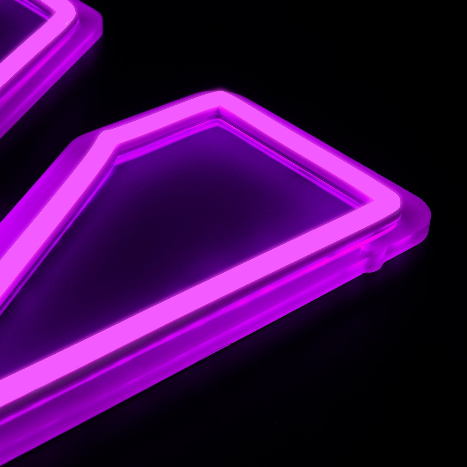 Northwestern Wildcats logo LED neon sign at a side angle, lit
