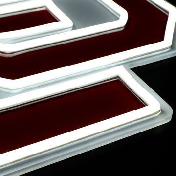 Oklahoma Sooners Logo LED neon sign at a side angle, lit