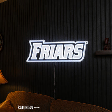 Providence Friars Wordmark LED Neon Sign - 24" x 8.37" above a couch - Saturday Neon