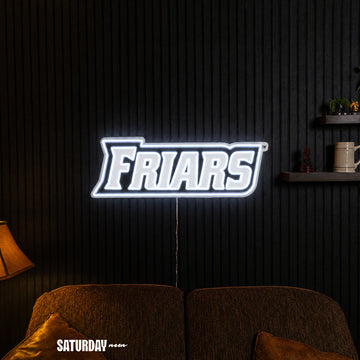 Providence Friars Wordmark LED Neon Sign - 24" x 8.37" in a living room - Saturday Neon