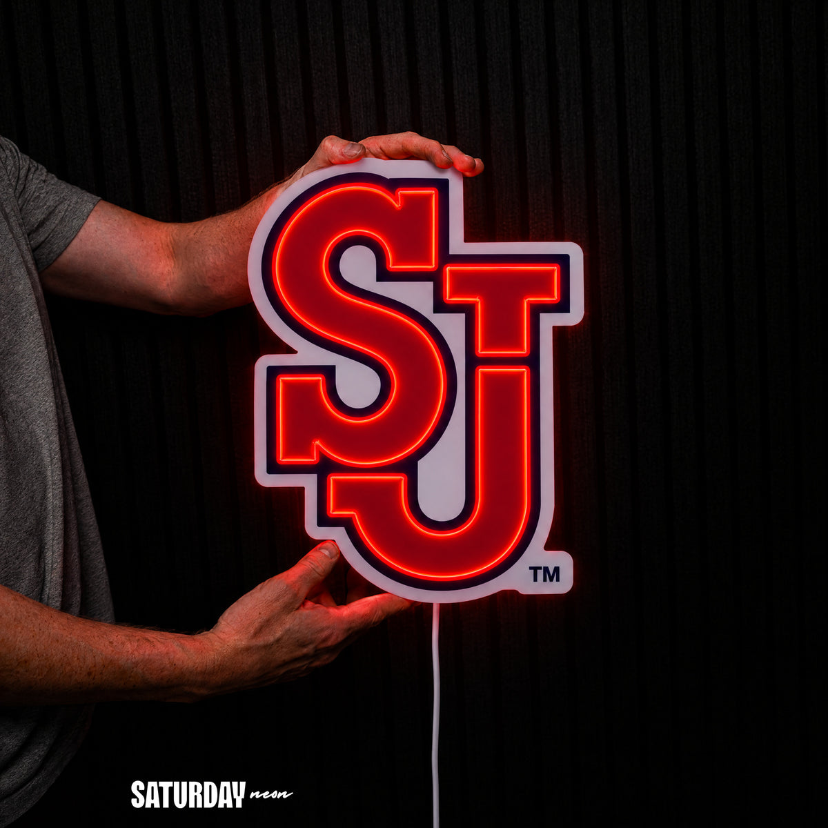 St. John's Red Storm SJ LED Neon Sign - Standard (10.96" x 15") held in hand for scale - Saturday Neon