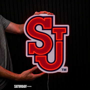 St. John's Red Storm SJ LED Neon Sign - Plus (17.53" x 24") held in hand for scale - Saturday Neon