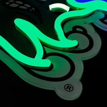 Tulane Green Wave logo LED neon sign at a side angle, lit