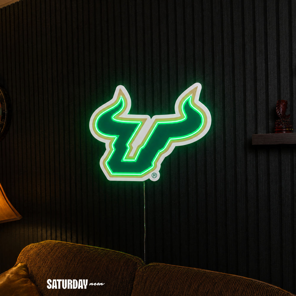USF Bulls LED Neon Sign - Max (32" x 26.05") above a couch - Saturday Neon