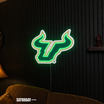 USF Bulls LED Neon Sign - Max (32" x 26.05") above a couch - Saturday Neon