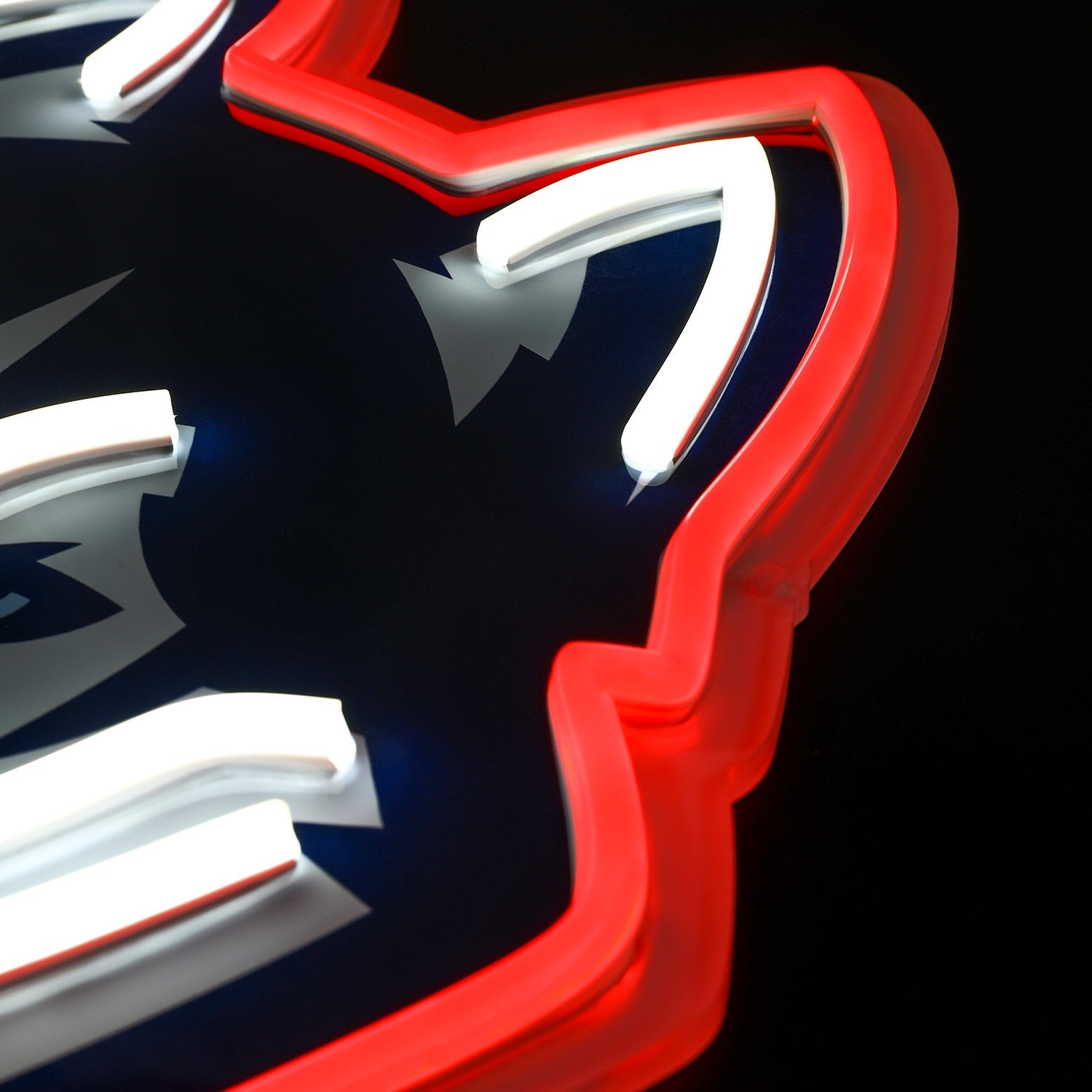 UConn Huskies logo LED neon sign at a side angle, lit