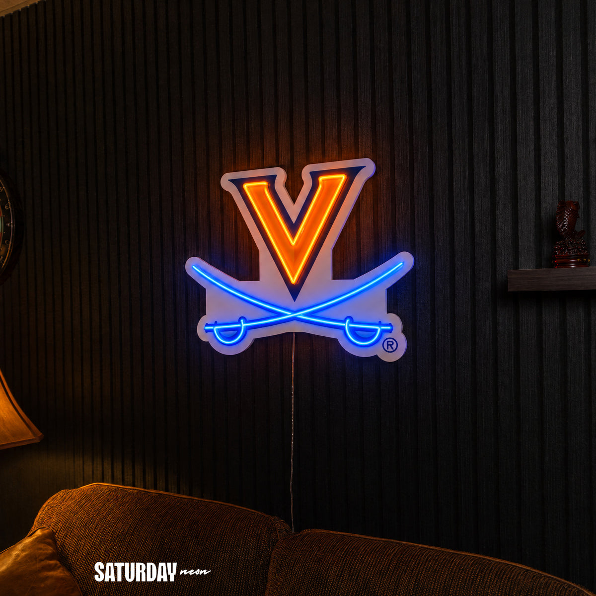Virginia Cavaliers V-Sabre LED Neon Sign - Max (32" x 26.39") above a couch - Saturday Neon