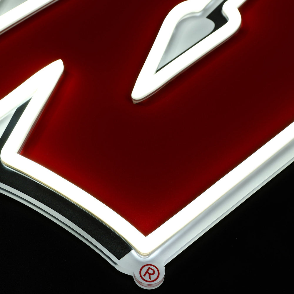 Wisconsin Badgers logo LED neon sign at a side angle, lit