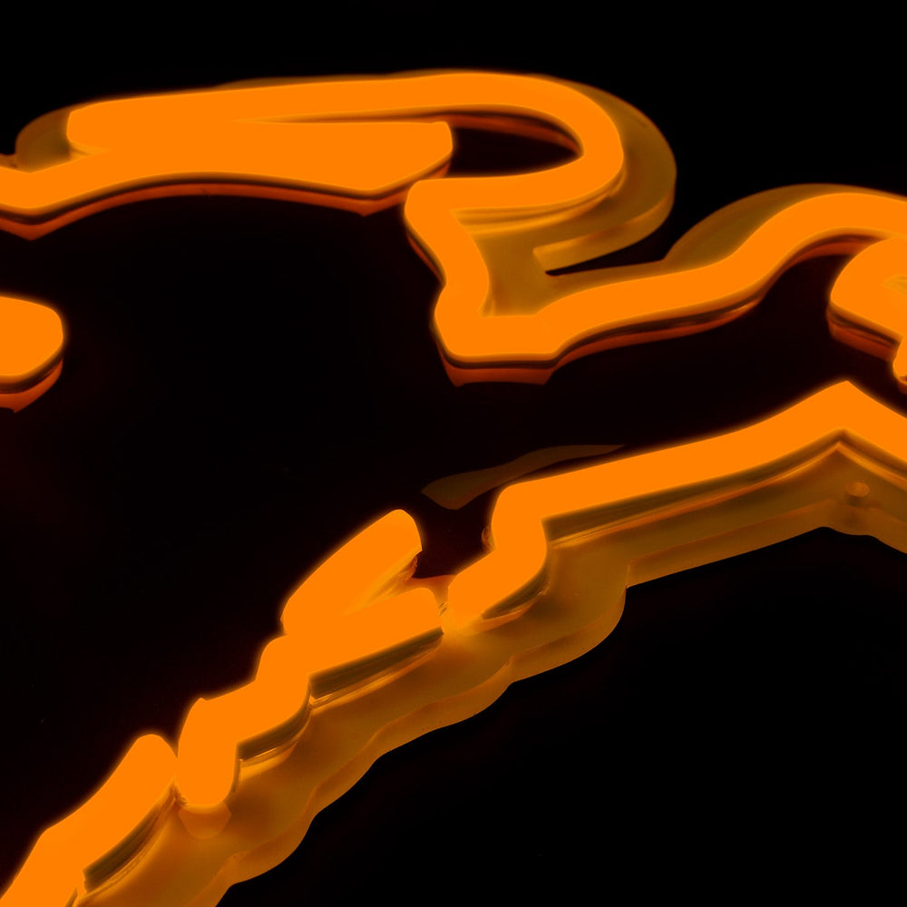 Wyoming Cowboys logo LED neon sign at a side angle, lit