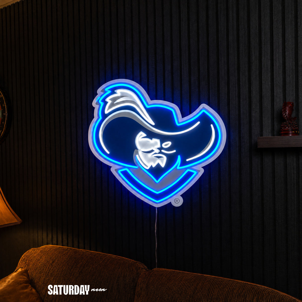 Xavier Musketeers Musketeer LED Neon Sign - 24" x 22.41" above a couch - Saturday Neon